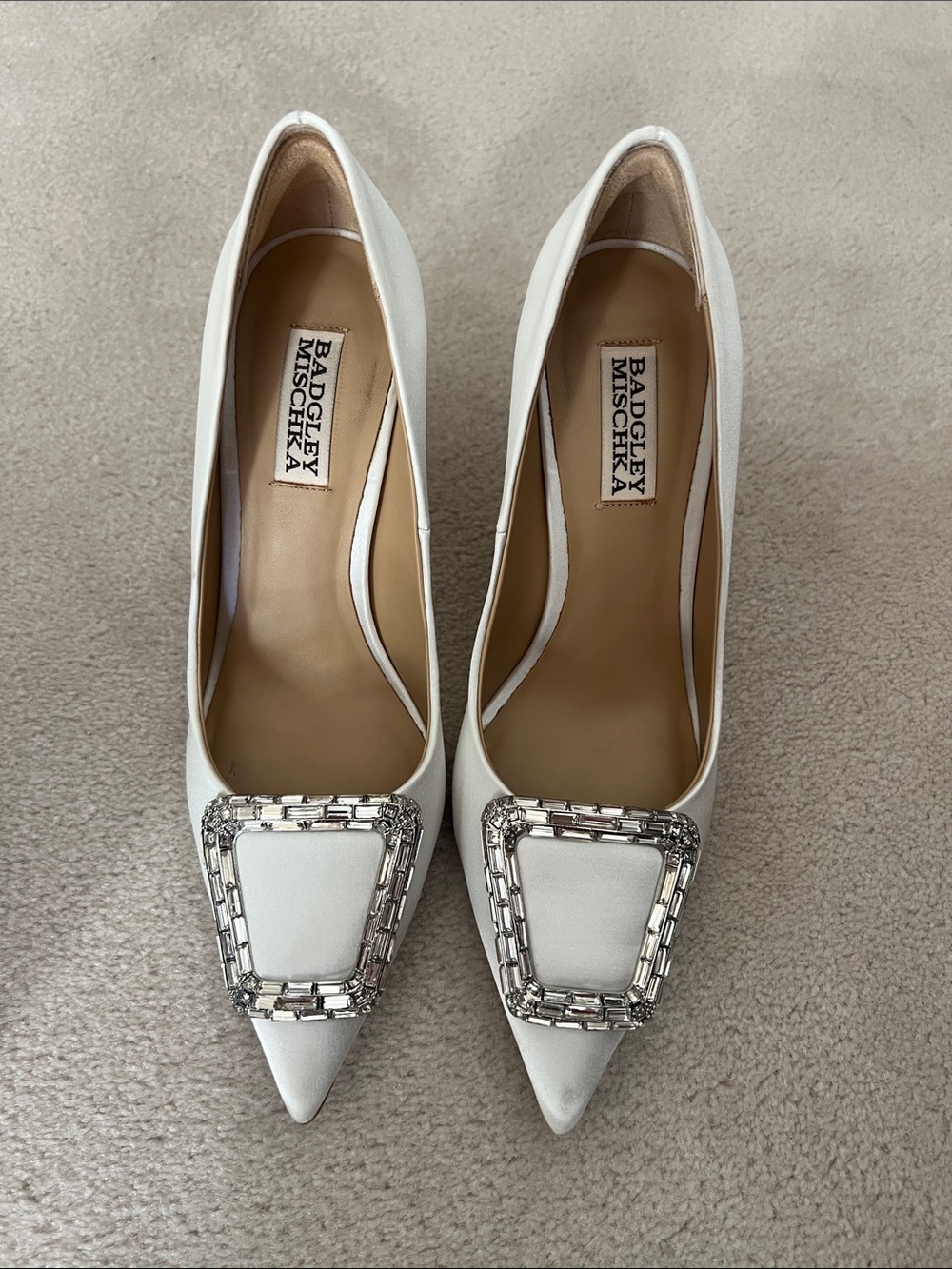 Badgley Mischka ivory pointed-toe pumps with crystal buckle